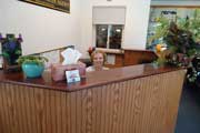 Jess at her desk.